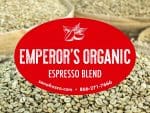 Emperor's Organic Espresso Blend - Rich Fusion of Flavors, with Vibrant Green Coffee Beans in the Background